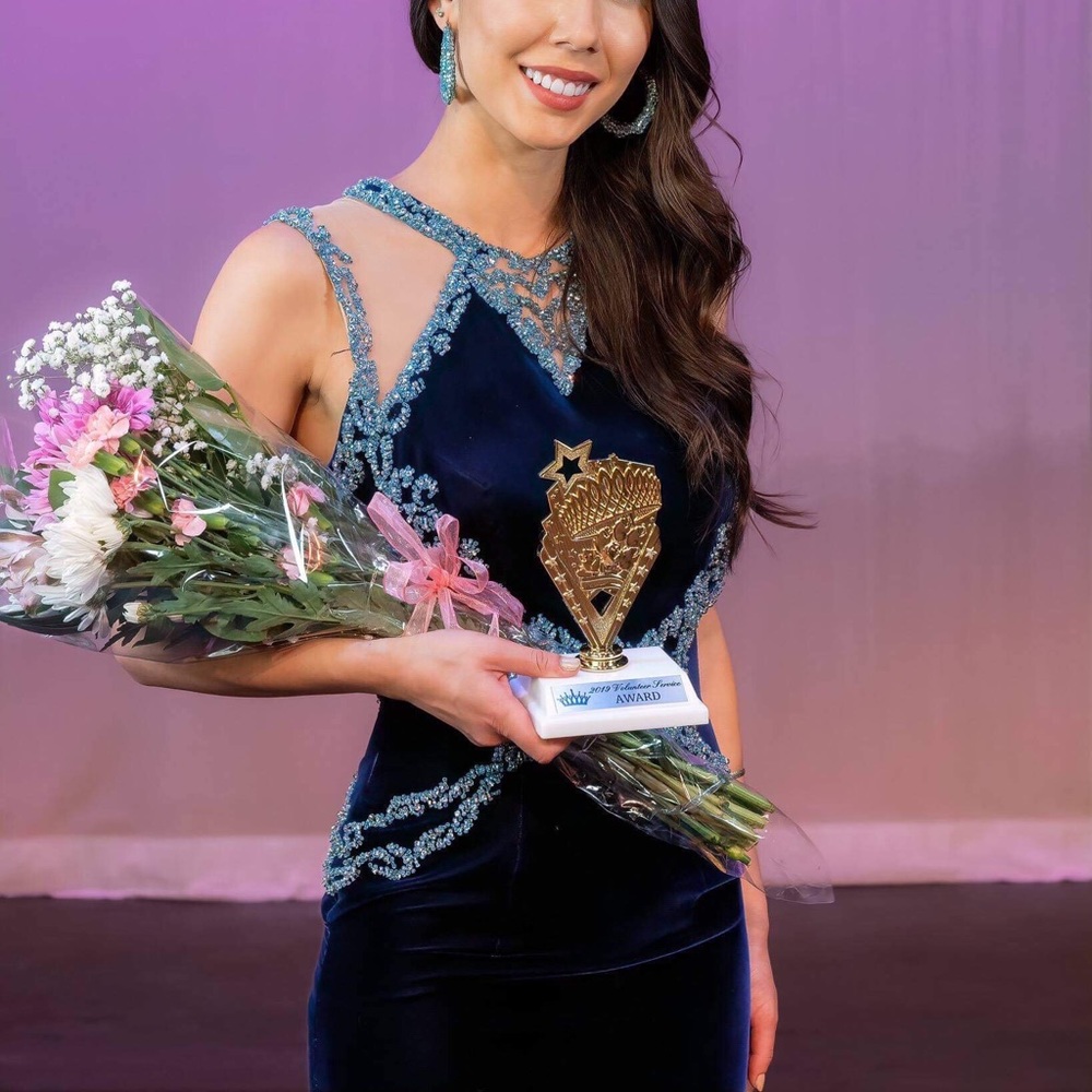Winning Blue Velvet Sherri Hill Gown